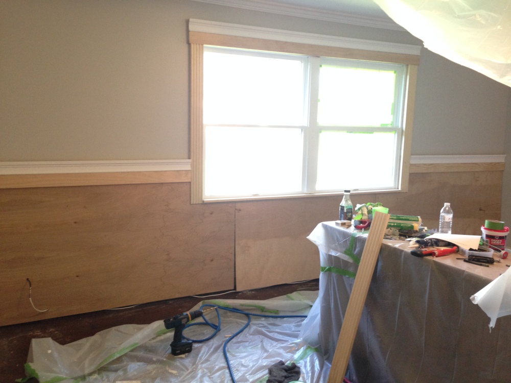 Wainscoting time! We also added a beautiful framed trim to the windows to make them more grand